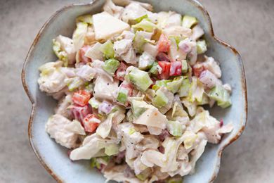 Chicken Salad with celery and bell pepper in a serving bowl