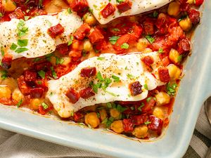 Baked cod with chickpeas tomato sauce and chorizo