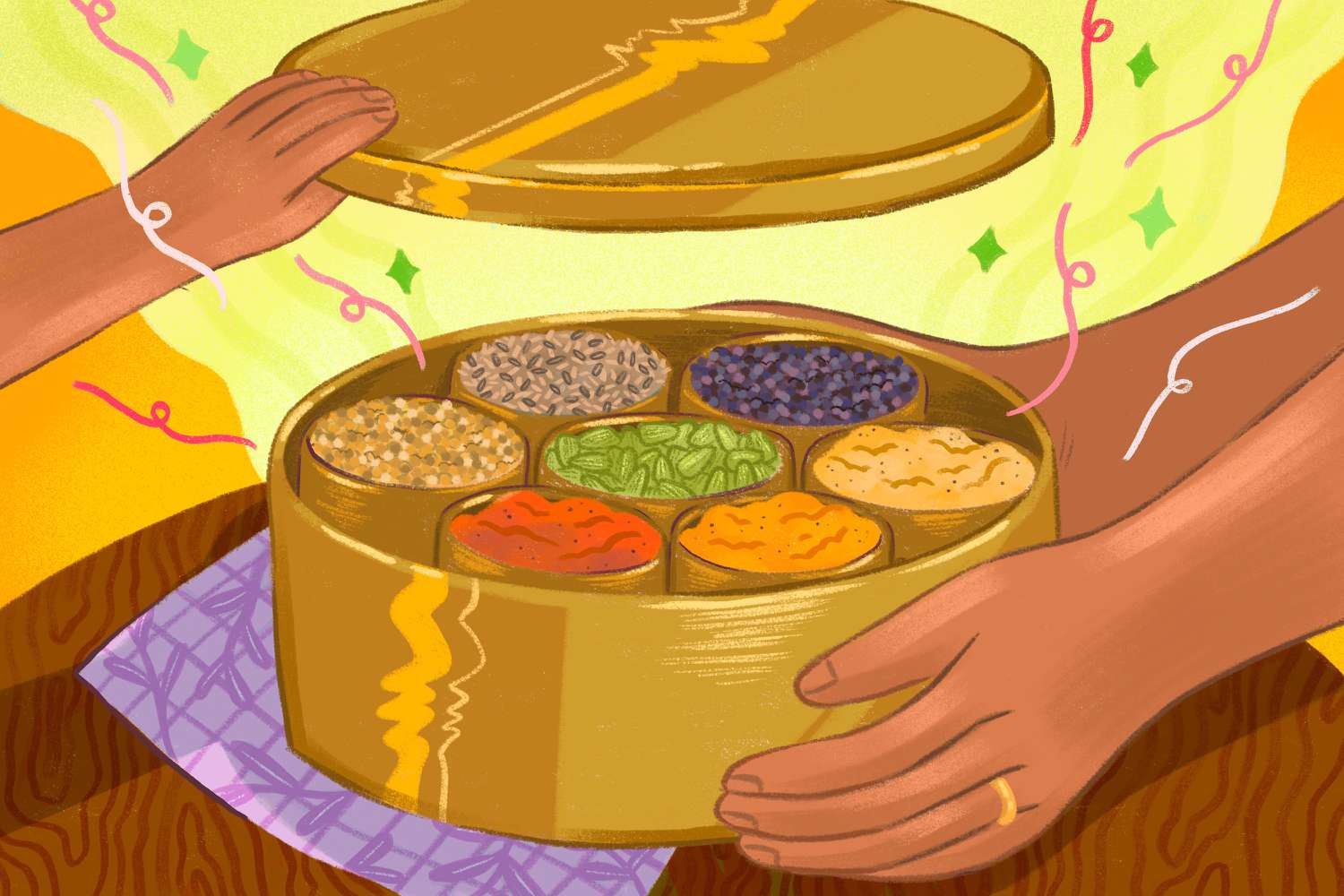 Hands opening a masala dabba filled with spices