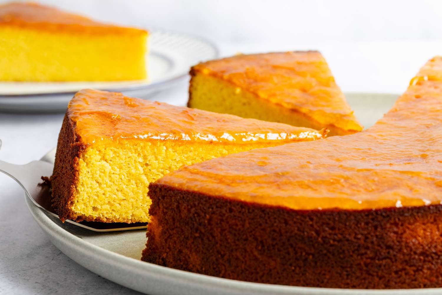 Whole Orange Cake, close up, 2 slices cut out