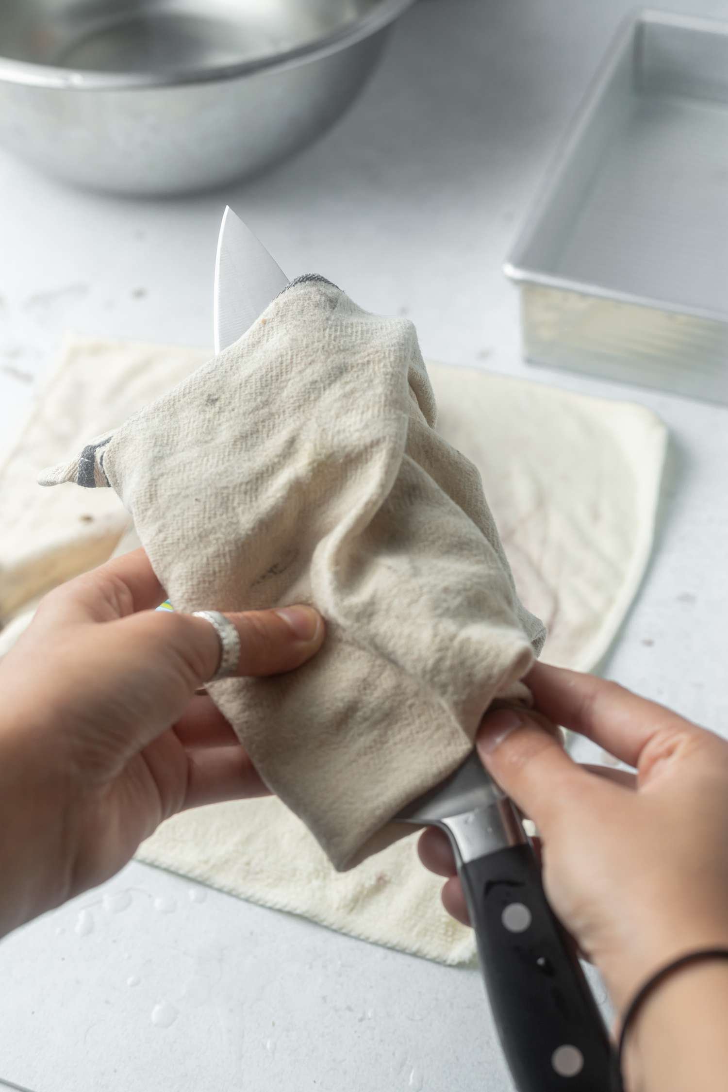 Wash and dry knife after sharpening on a whetstone