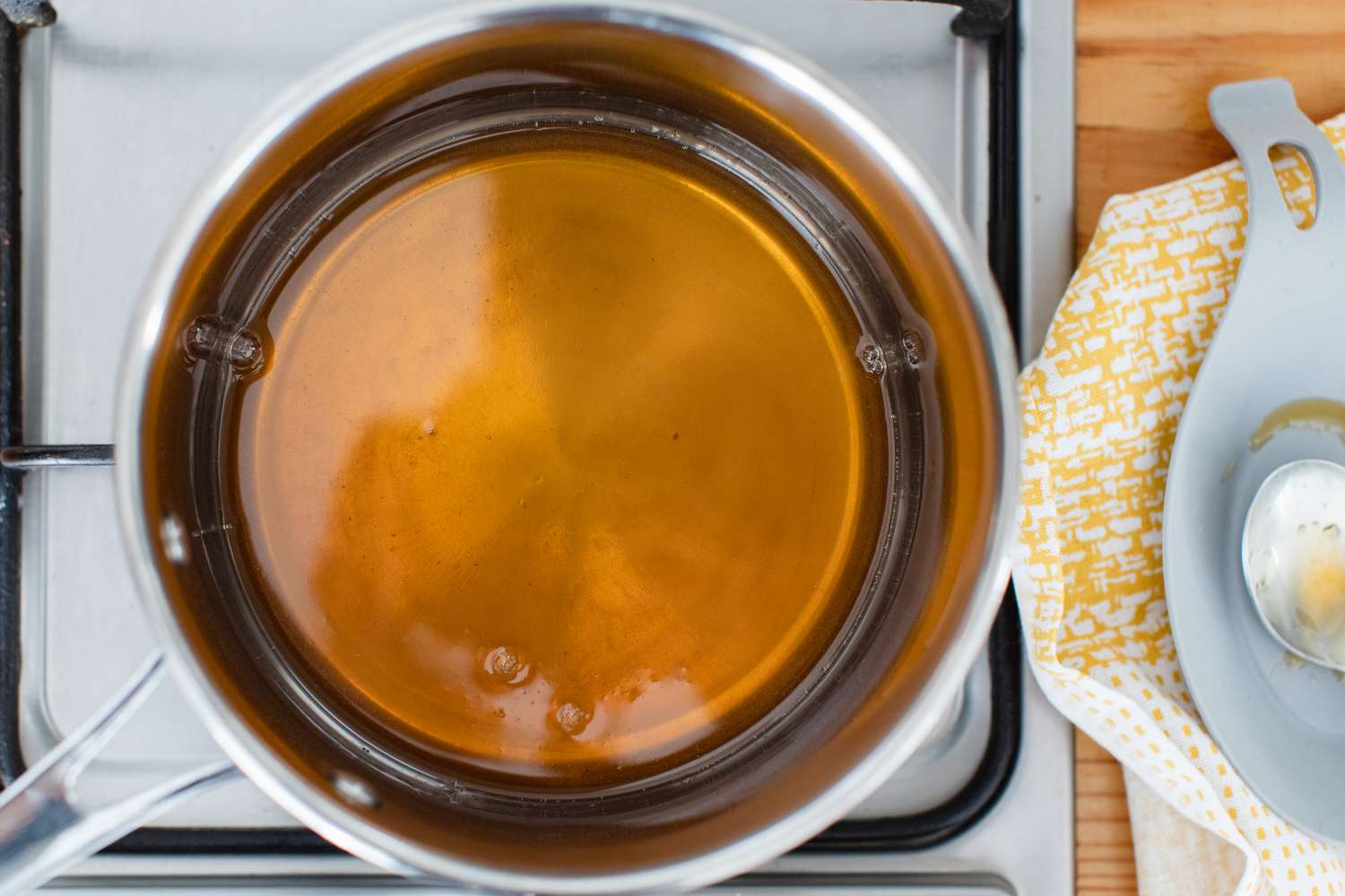 Pot of Honey and Lemon on Stove for Smoked Paprika Chicken Recipe