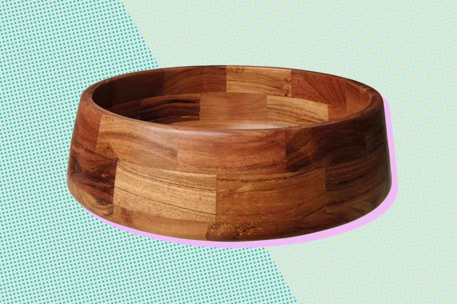 A wooden serving bowl on a colorful background