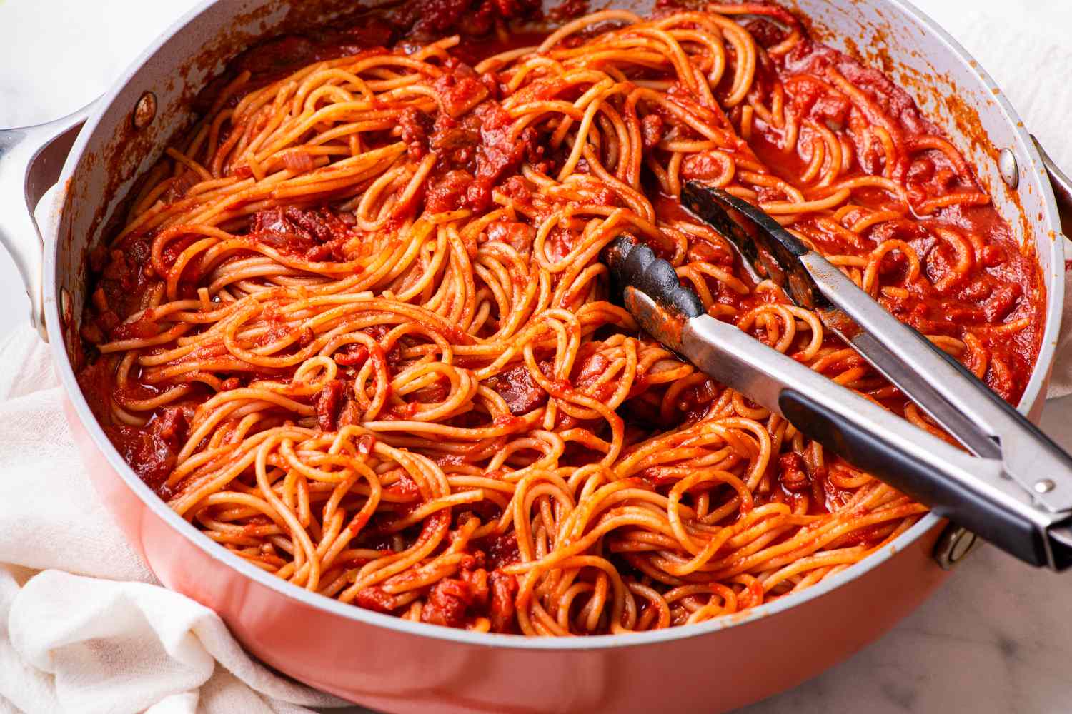 Marry Me Pasta in a large pan with tongs