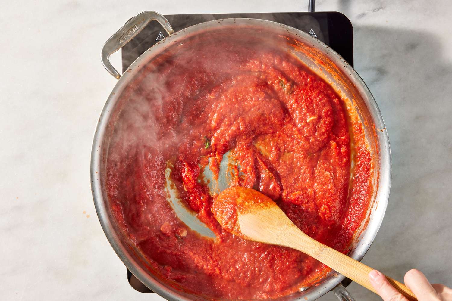 tomato sauce cooked in a pot (slightly thickened) for pasta alla norma recipe 