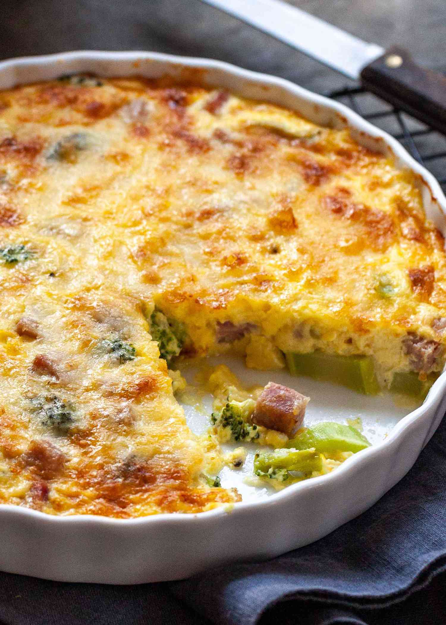 Gluten-free Quiche Recipe - close up of ham and broccoli quiche in a white dish