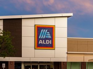 Aldi storefront with logo on the building