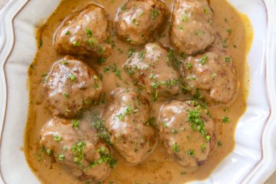 A dish of Swedish meatballs in gravy.