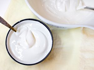 Overhead view of two bowls of Greek yogurt
