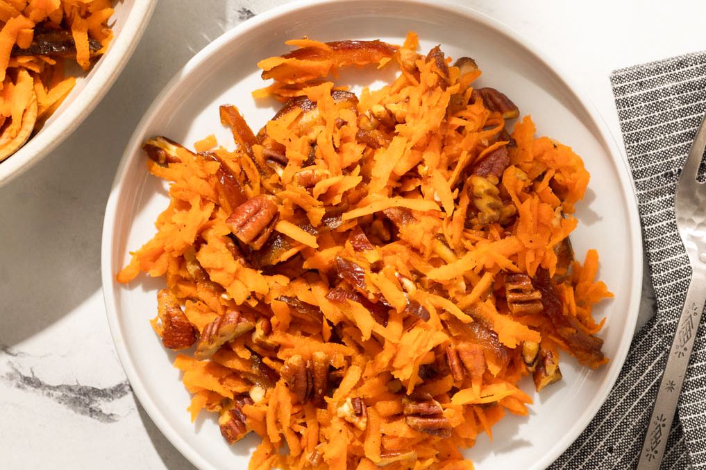 overhead view of Shredded Carrot Salad on a salad plate