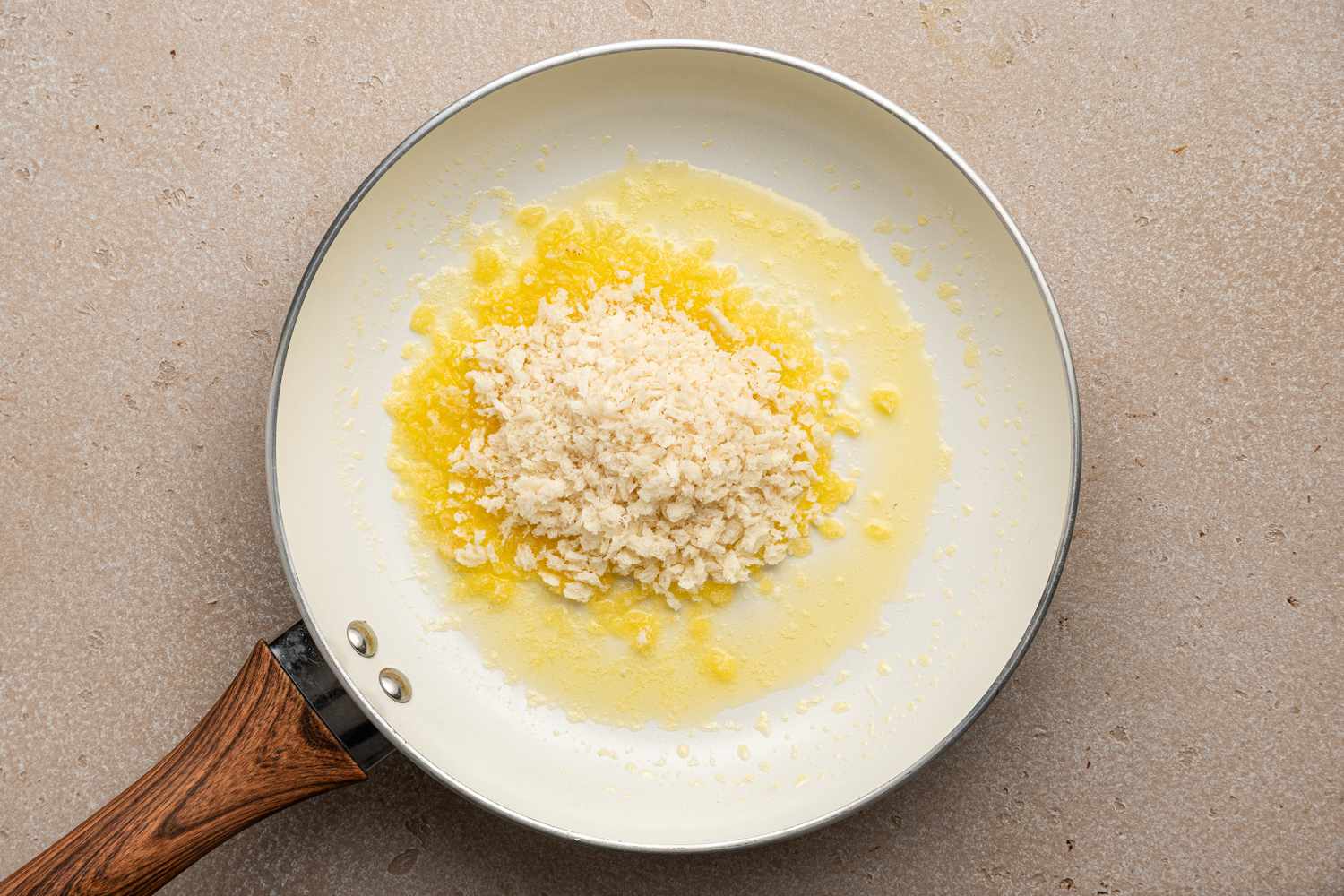 Breadcrumbs in a Skillet of Melted Butter for Brussels Sprouts Caesar Salad Recipe 
