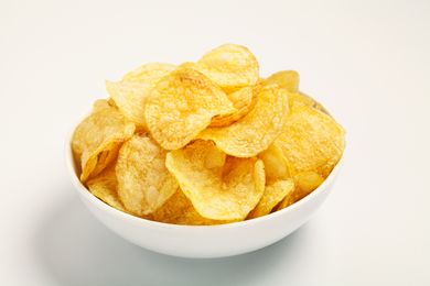 A bowl filled with potato chips