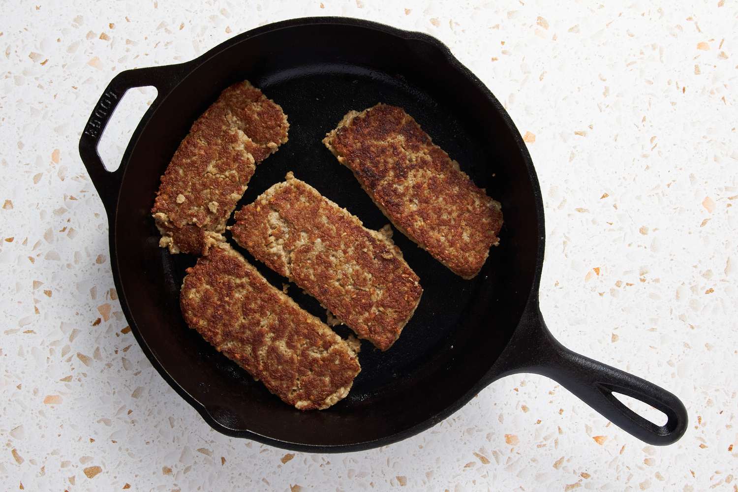 Goetta Flipped on the Cast Iron Skillet 
