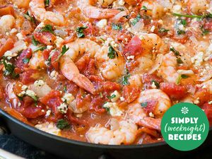 Shrimp in a tomato-based sauce with herbs, skillet-style weeknight recipe featured on Simply Recipes