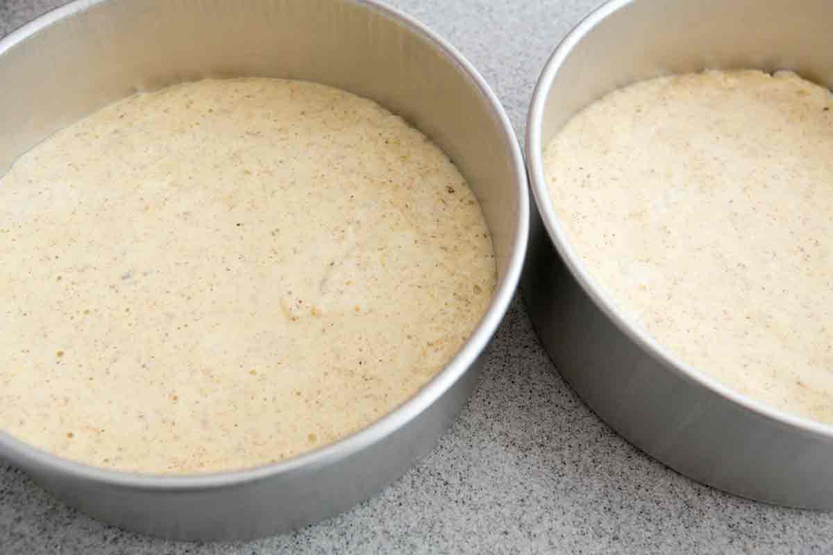 walnut mocha torte pour patter into cake pans