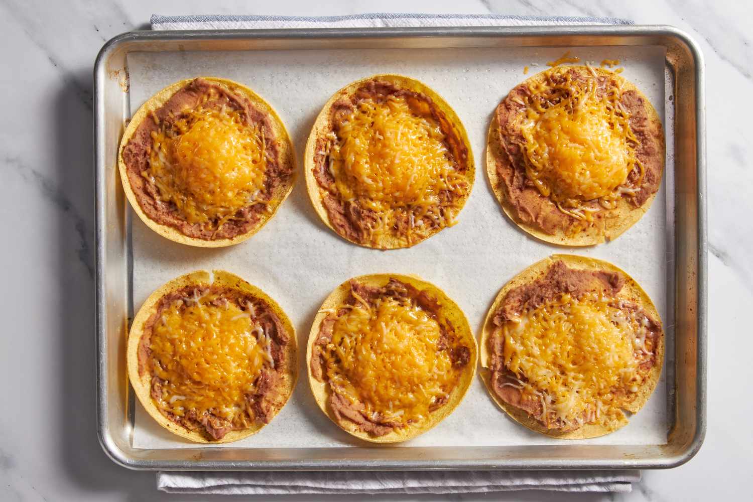 Baked cheesy tacos (not folded yet) for cheesy baked taco recipe