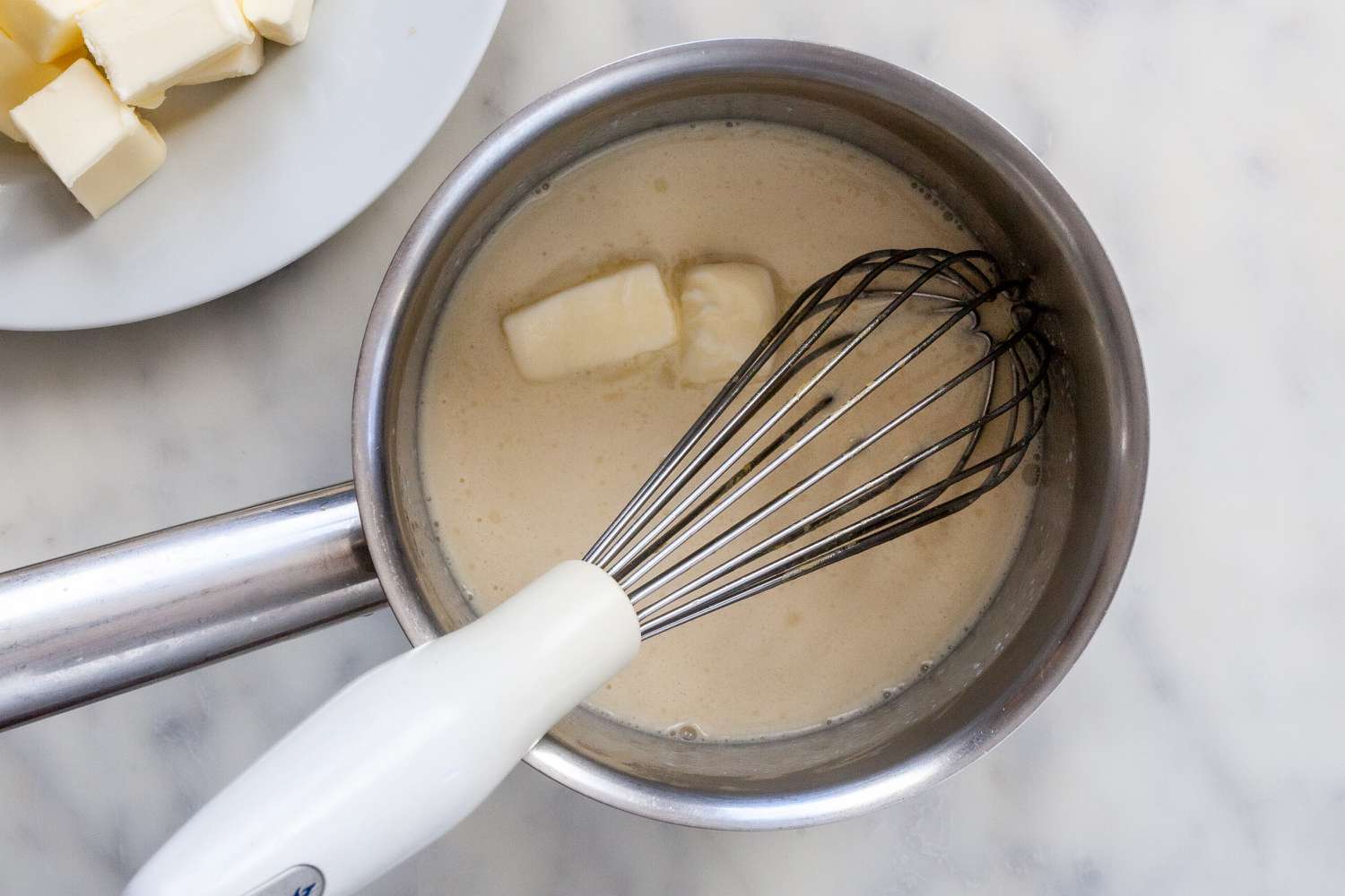 Add butter to classic buerre blanc sauce