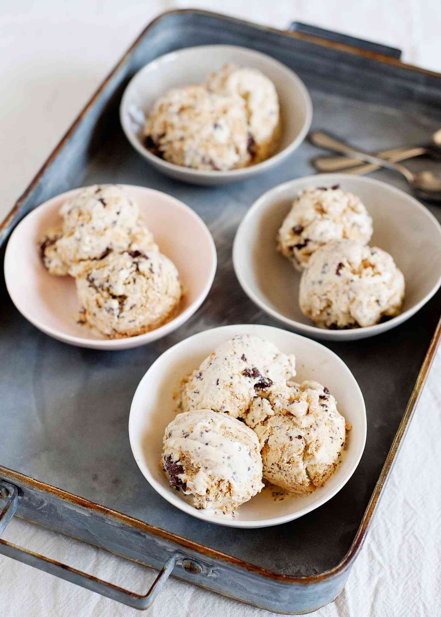 Best S'Mores Ice Cream - scoops of ice cream in small bowls on a silver tray