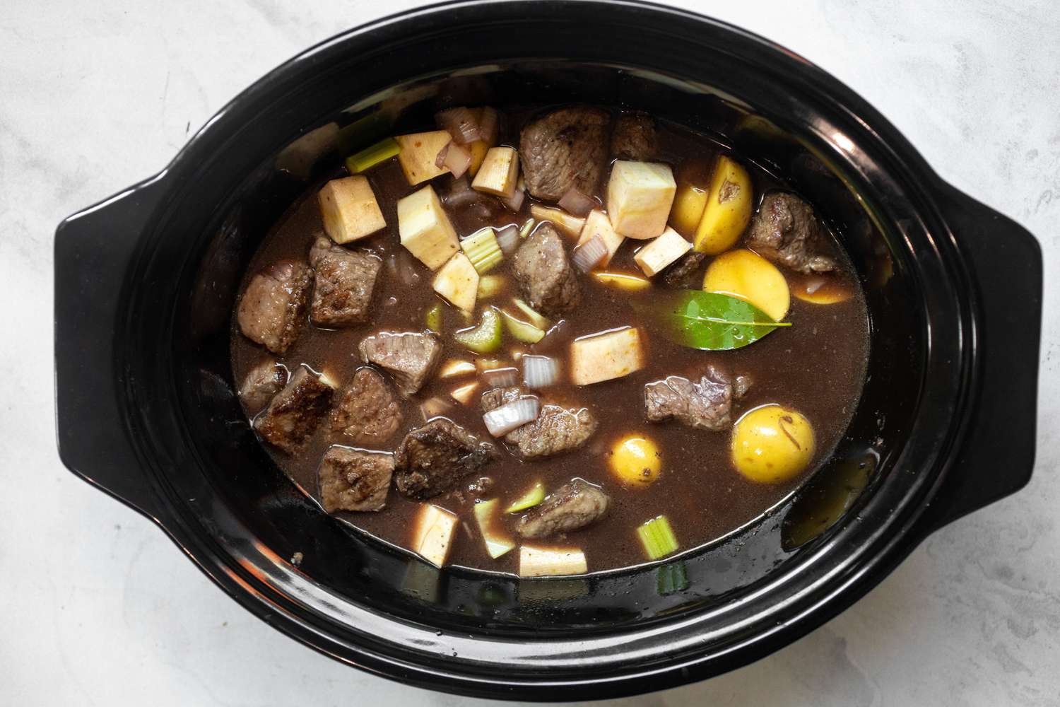 Beef Stew Ingredients in Slow Cooker