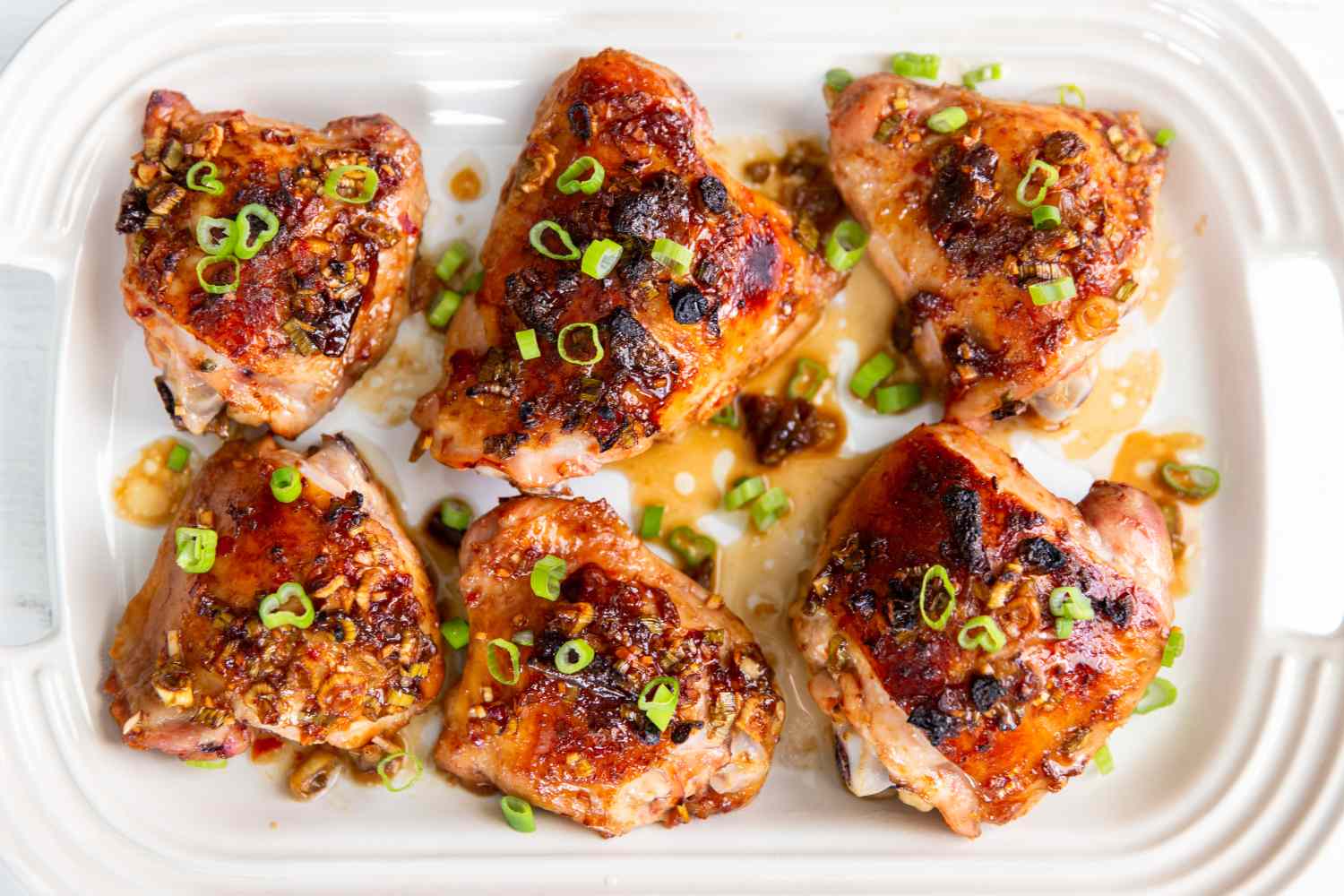 overhead view of Retro Plum Jam Chicken thighs on a serving platter