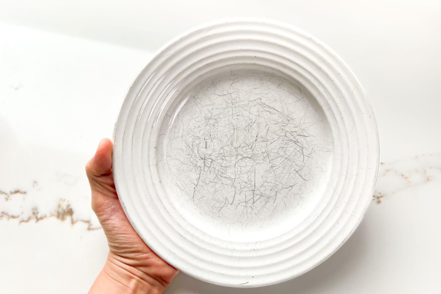 scratched white plate