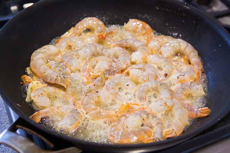 Shrimp Scampi cooking in skillet
