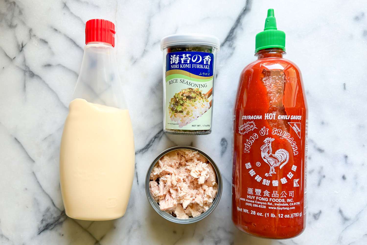 Ingredients to make spicy tuna cucumbers