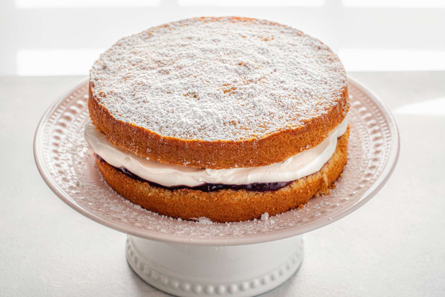 Victoria Sponge Cake with Whipped Cream and Jam