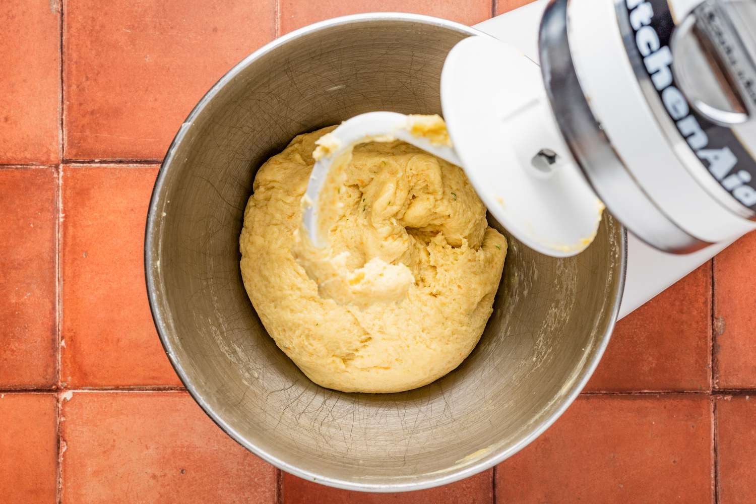 Pan de muerto dough in the mixer bowl (dough no longer sticky)
