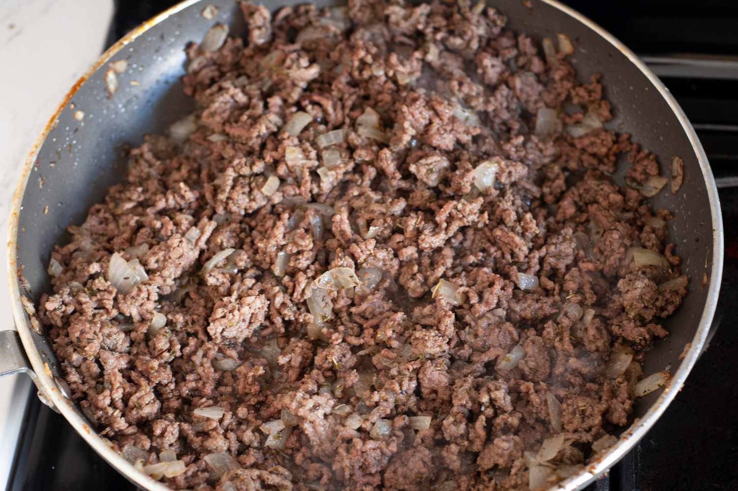 Ground Meat Cooked in a Pan for Hawaiian Roll Sliders Recipe