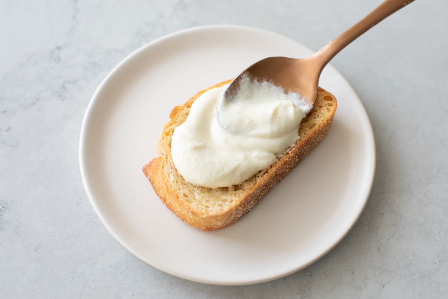 Toast Topped with a Spoonful of Whipped Ricotta