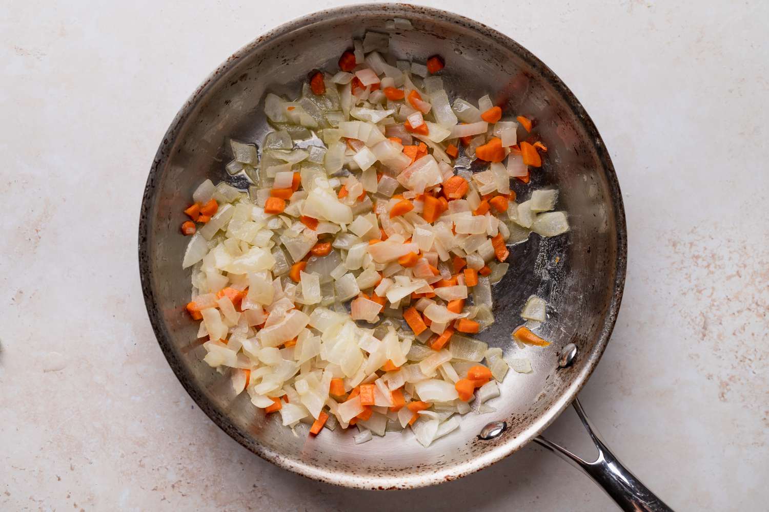 Sauteing vegetables to make easy shepherds pie recipe.