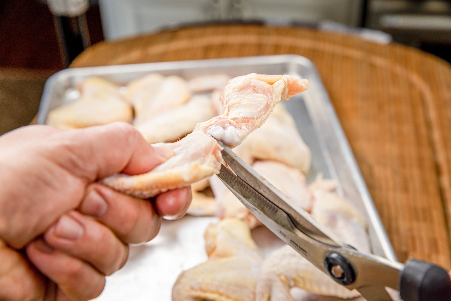 Chicken Wings Cut into Pieces Using Poultry Scissors for Smoked Chicken Wings Recipe