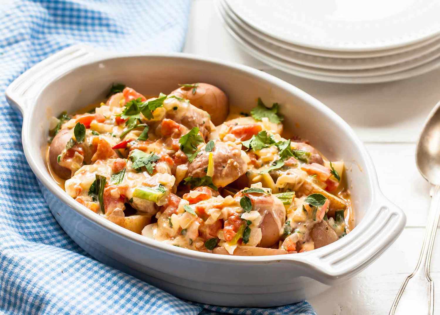 New Potatoes with Cheese and Tomatoes