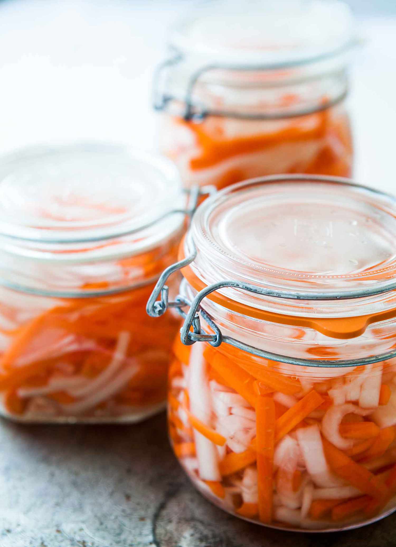 three jars of carrot and daikon radish pickles