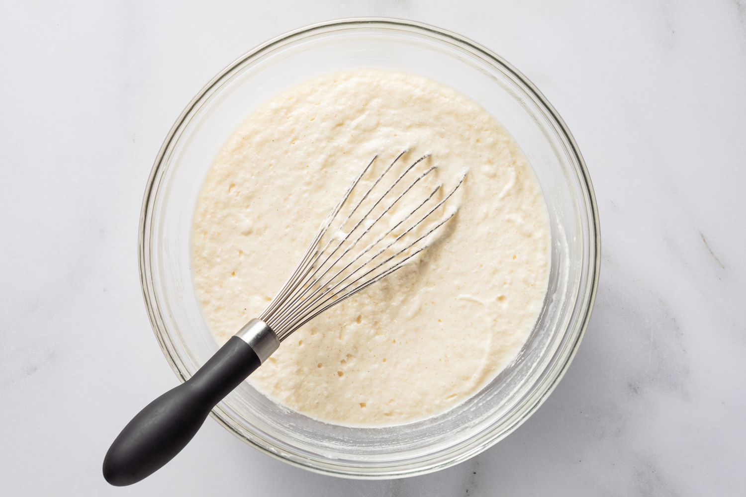 magic cake batter (egg whites not completely whisked in) 