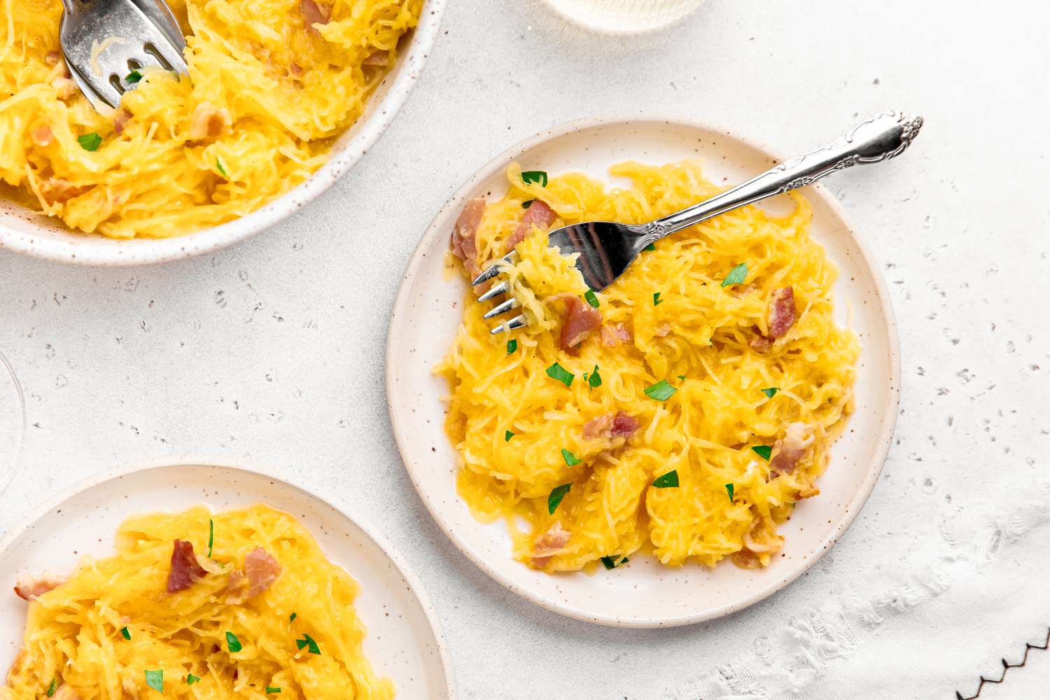 Spaghetti Squash Carbonara on Two Plates and More in a Bowl 