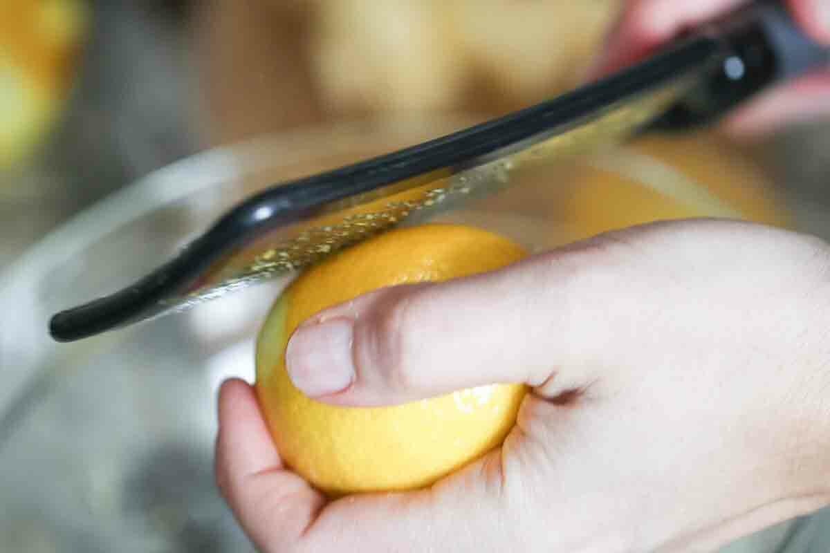 Easy Lemon Curd Recipe zesting the lemon