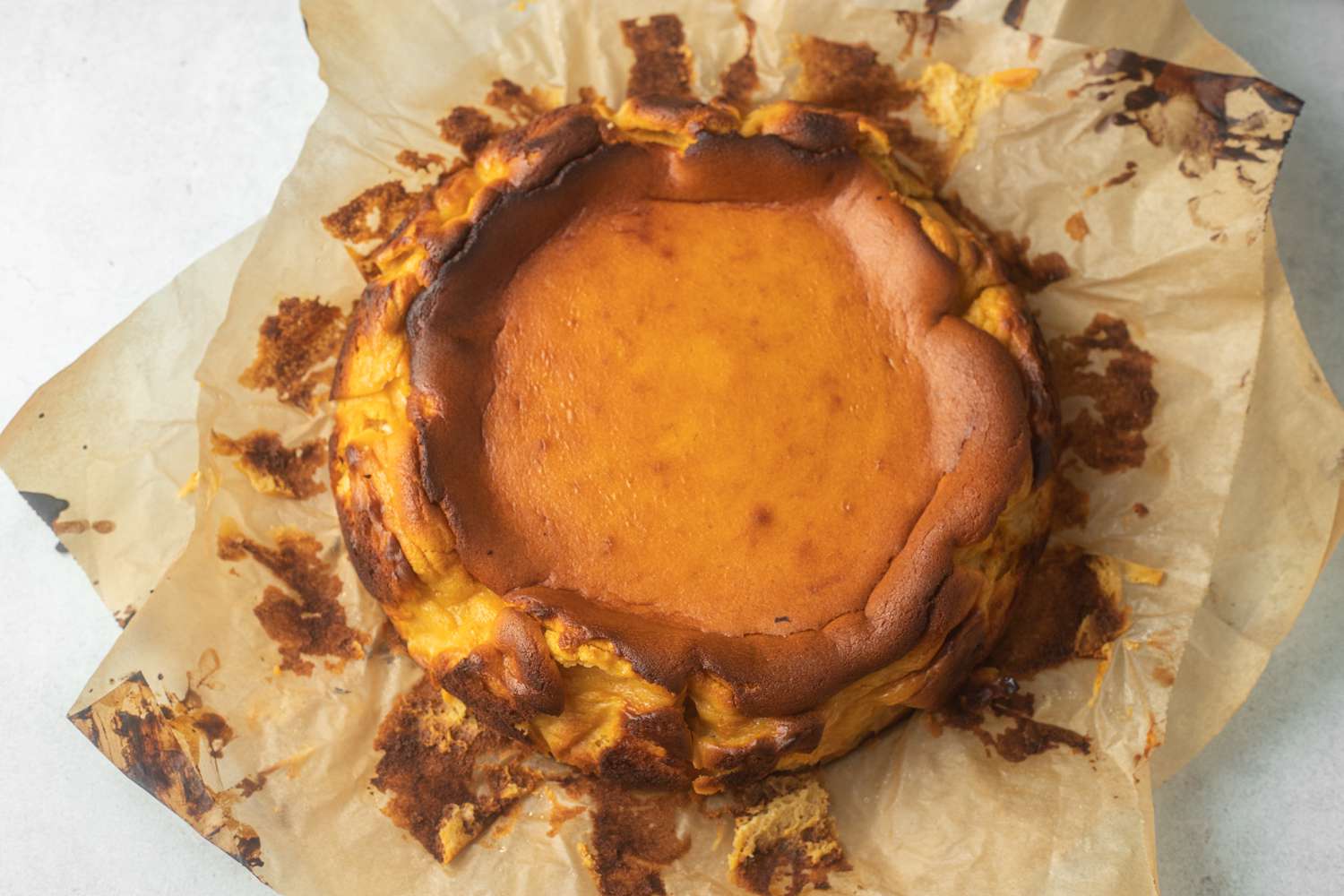 Overhead view of a baked basque cheesecake.