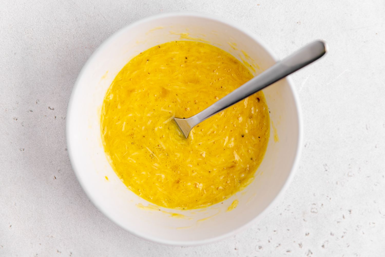 Carbonara Sauce Mixed Together in a Bowl 