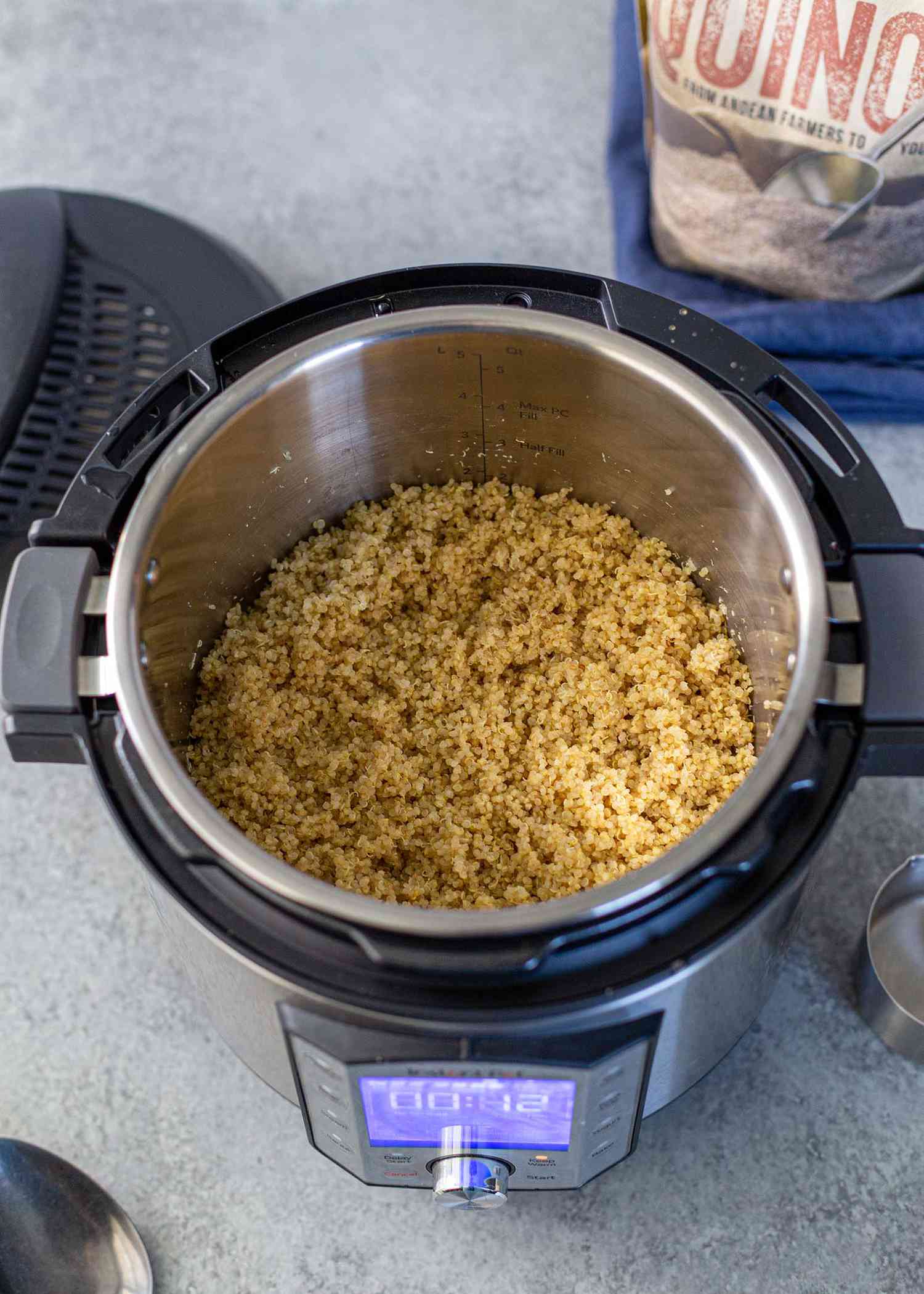 Pot of cooked quinoa in Instant Pot