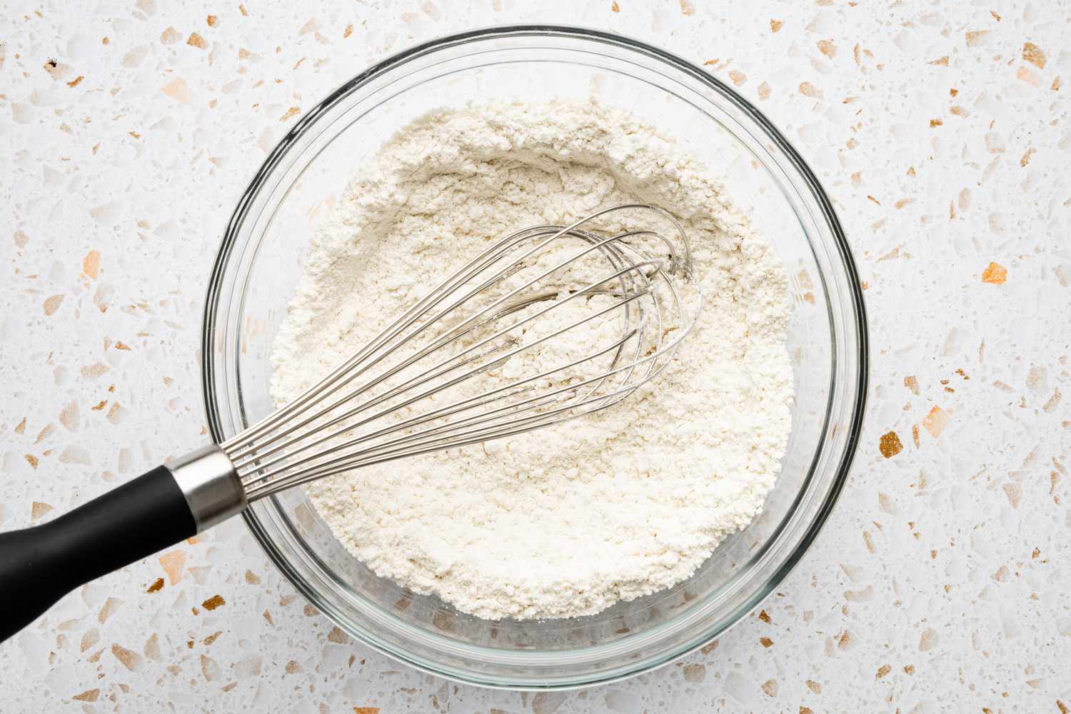 Dry Ingredients Whisked Together in a Bowl for Blueberry Muffin Tops Recipe