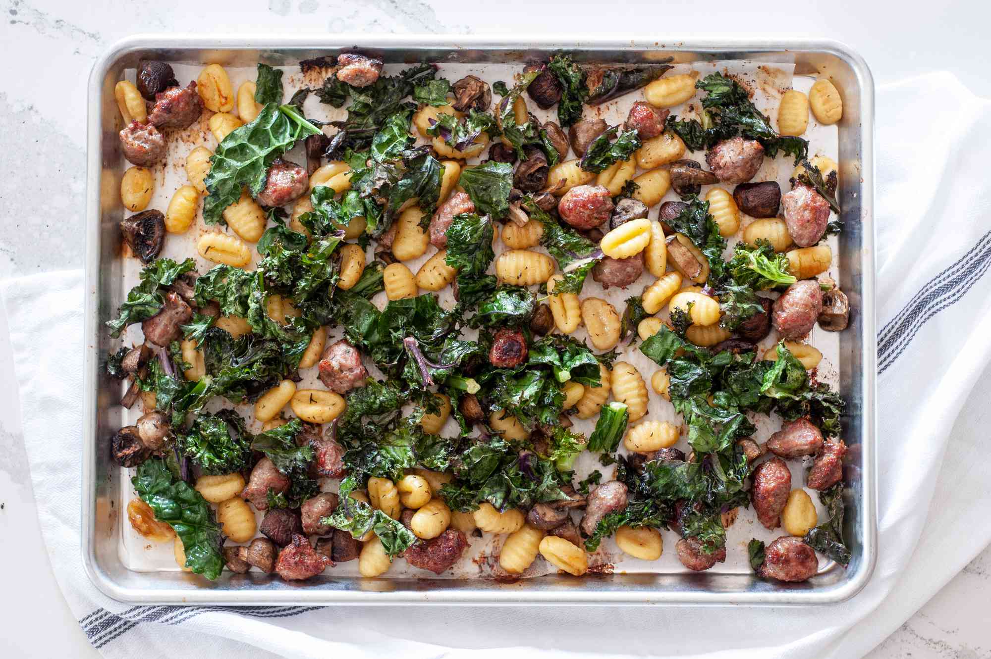 Sheet Pan Gnocchi With Mushrooms, Sausage, and Kale