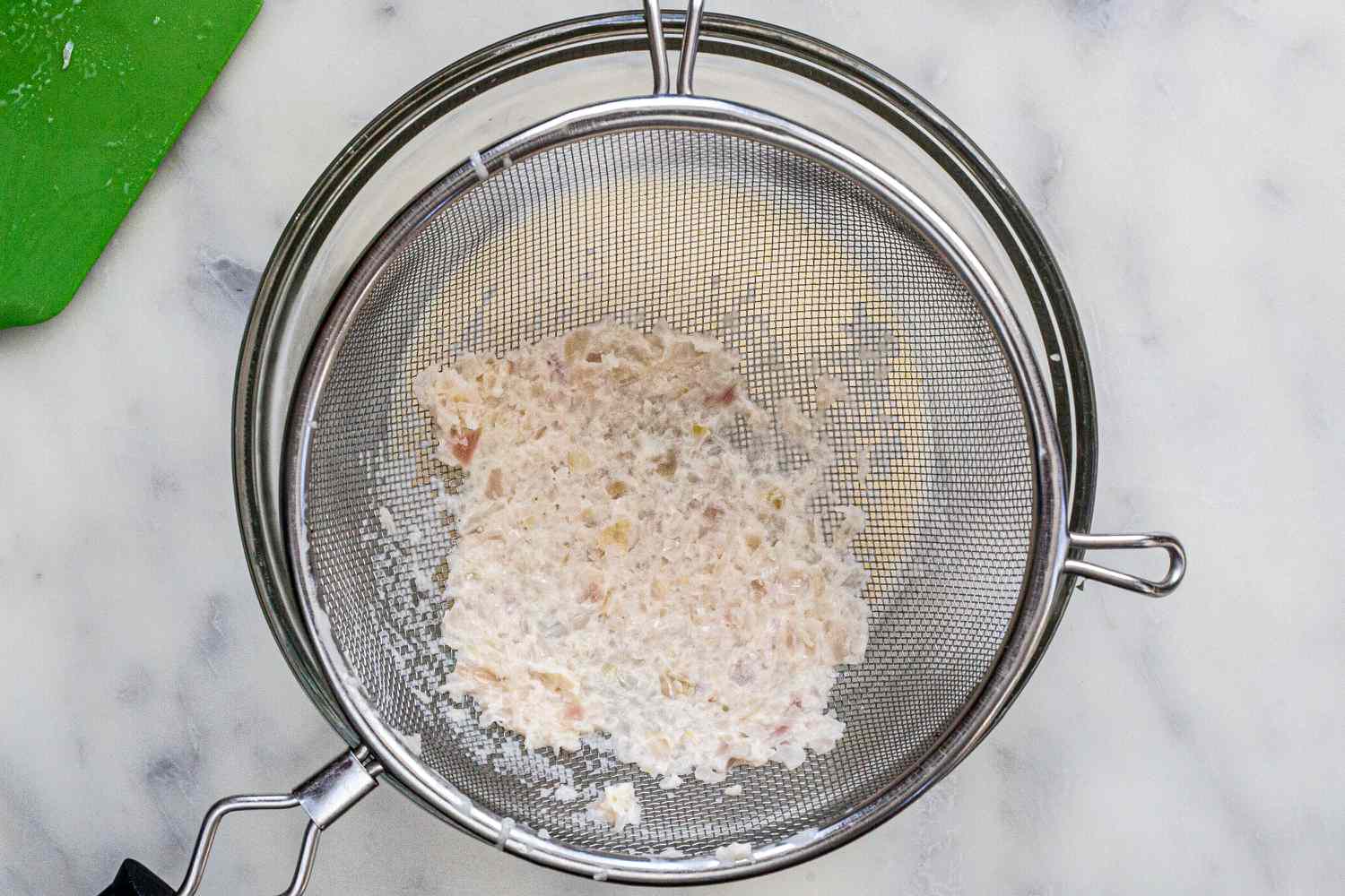 Run classic buerre blanc sauce through a sieve