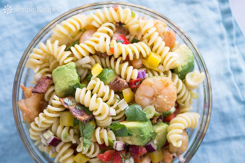 A bowl of shrimp pasta salad