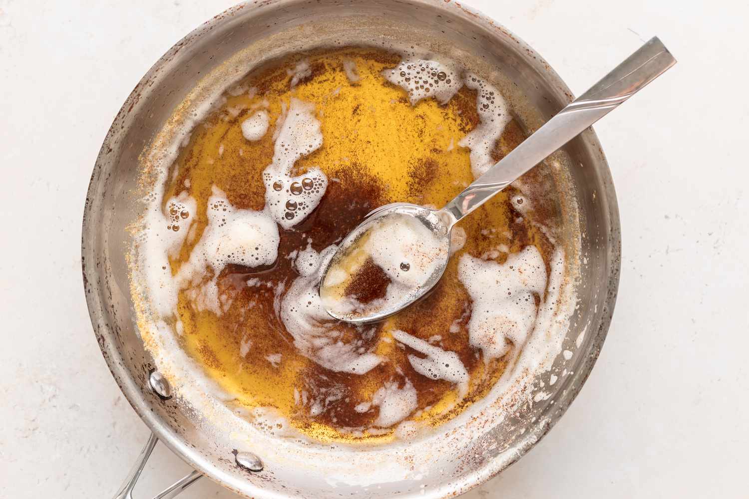 how do you make browned butter in a pot with a spoon.