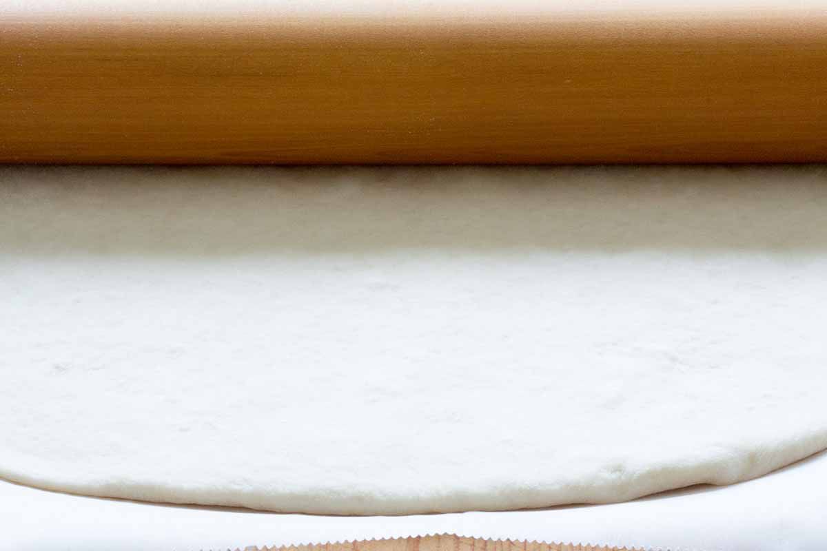 Roll out the dough for the stromboli to a 14 by 11 inch rectangle