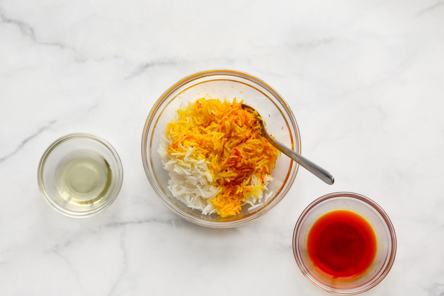 Small Bowl of Rice Mixed with Some Saffron Water and Cooking Oil