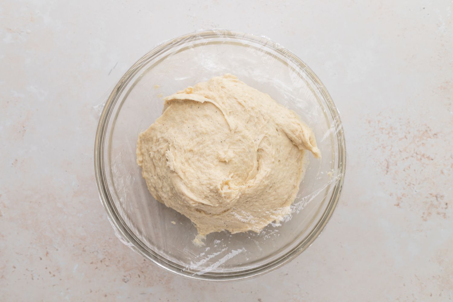 Chilling dough in a glass bowl to make a kringle recipe.