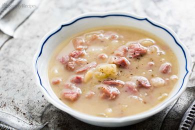 Ham and Potato Soup in a white bowl with blue trim